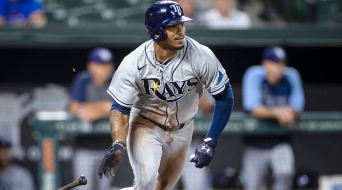 Aug 27, 2021; Baltimore, Maryland, USA; Tampa Bay Rays shortstop Wander Franco (5) at bat against the Baltimore Orioles during the third inning at Oriole Park at Camden Yards.